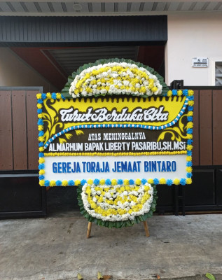 Papan Bunga Duka di Masirei
